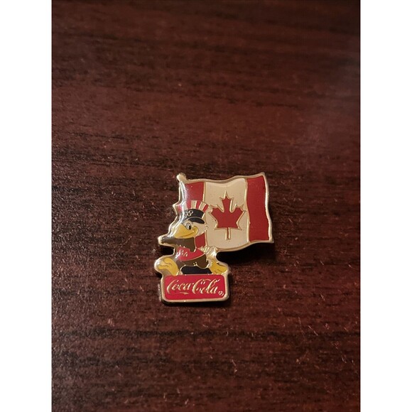 Vintage 1984 Los Angeles Olympics‎ Coca Cola Sam Eagle Canada Flag Lapel Pin - Picture 1 of 3